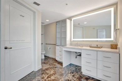 Step into this elegant two-bedroom, two-and-a-half-bathroom