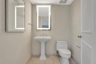 Step into this elegant two-bedroom, two-and-a-half-bathroom