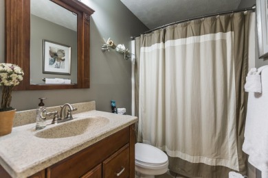 Discover the pinnacle of lakeside luxury at 97-1 Eagle Drive