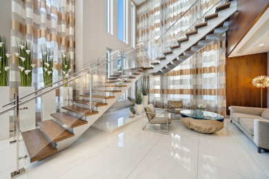 This ultra-luxury Condominium Unit with a S.W. exposure, and