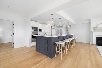 Experience refined coastal elegance in this fully renovated