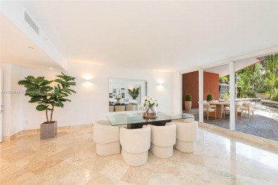 A rare find! This 4,200 SF two-level residence at the Ocean Club