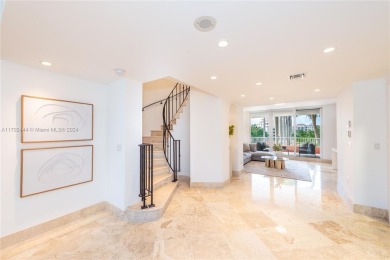 A rare find! This 4,200 SF two-level residence at the Ocean Club