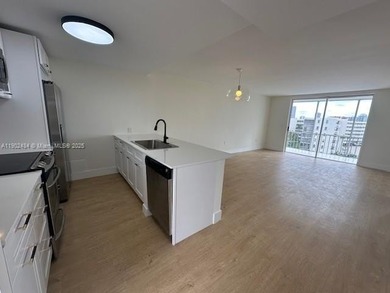 This beautifully and totally remodeled 55+ condo offers a