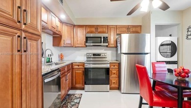 Beautifully renovated 2/2 condo in the sought-after 55+