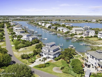 Welcome to 4 Sandy Point, a rare opportunity to own a