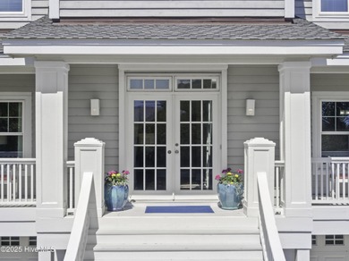 Welcome to 4 Sandy Point, a rare opportunity to own a