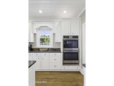 Welcome to 4 Sandy Point, a rare opportunity to own a