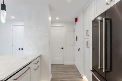 Experience luxury coastal living at its finest in this fully