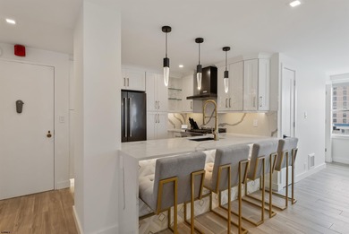 Experience luxury coastal living at its finest in this fully