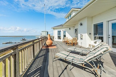 GORGEOUS custom-built home on Eckert Bayou and West Bay. This