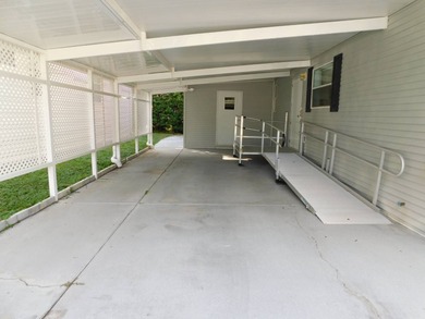 Step into this immaculately maintained 2004 Palm Harbor home