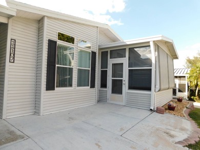 Step into this immaculately maintained 2004 Palm Harbor home