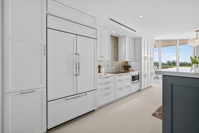 This spacious three-bedroom, three-bathroom first-floor Ocean