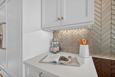 This spacious three-bedroom, three-bathroom first-floor Ocean