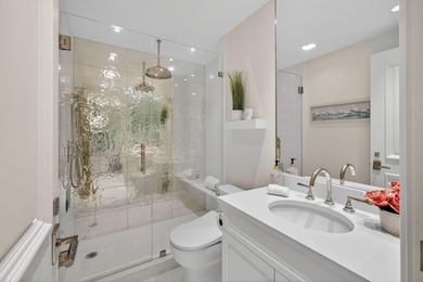 This spacious three-bedroom, three-bathroom first-floor Ocean