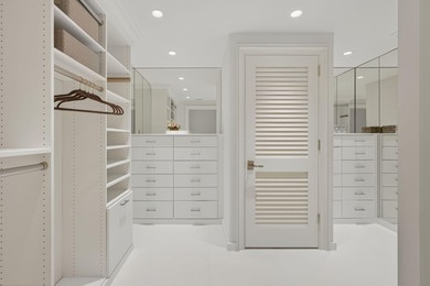 This spacious three-bedroom, three-bathroom first-floor Ocean