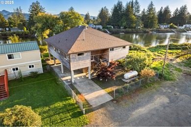 Beautiful custom-built riverfront cedar home, built in 2014