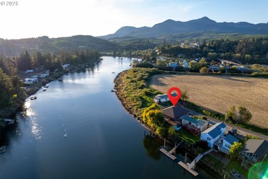 Beautiful custom-built riverfront cedar home, built in 2014