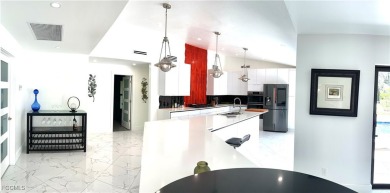 Modern Elegance Meets Florida Living in Imperial Golf Estates!