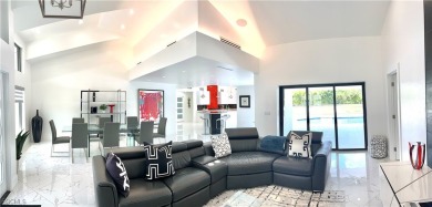 Modern Elegance Meets Florida Living in Imperial Golf Estates!