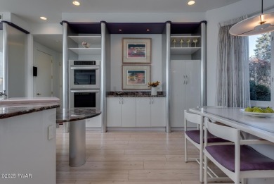 This striking three story, 7000+ square foot residence is