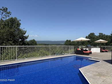 This striking three story, 7000+ square foot residence is