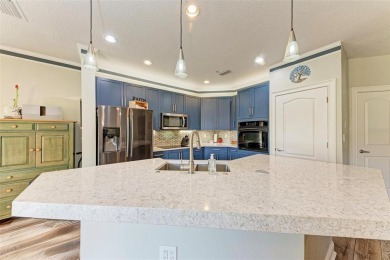 Short Sale. Gated townhome community offers low-maintenance