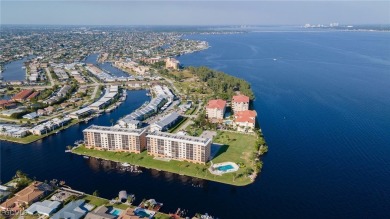 Renovated - NEW AC, corner unit offers wide canal, partial river