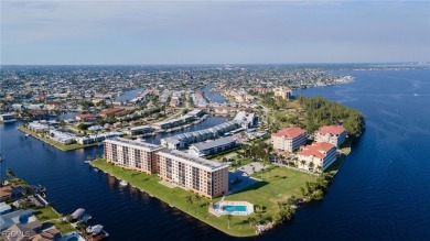 Renovated - NEW AC, corner unit offers wide canal, partial river