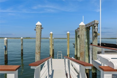 Contemporary Coastal Bayfront Retreat over-looking bird