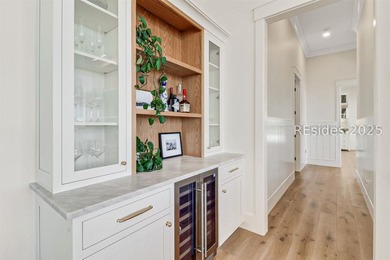 This nearly one-acre marsh-front property in Windmill Harbour