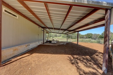 Enjoy country living and no city taxes minutes from town. This