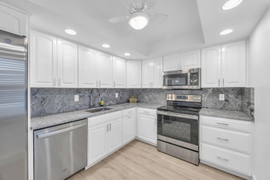 Updated 1st Floor Condo with Private Access! Step into coastal