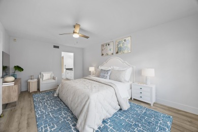 Updated 1st Floor Condo with Private Access! Step into coastal