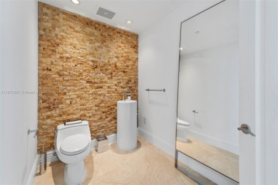 Stunning high-floor corner 2-bed, 2.5-bath residence with