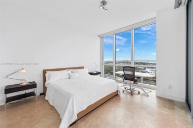 Stunning high-floor corner 2-bed, 2.5-bath residence with