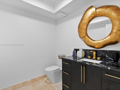 Commanding the skyline of Aventura, this Peninsula II penthouse