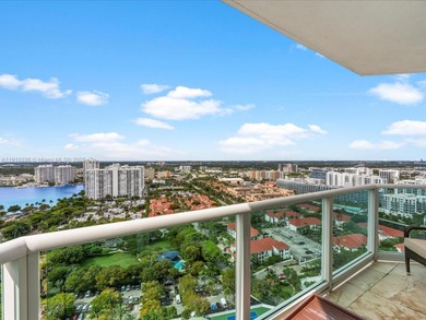 Commanding the skyline of Aventura, this Peninsula II penthouse
