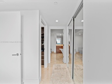 Commanding the skyline of Aventura, this Peninsula II penthouse