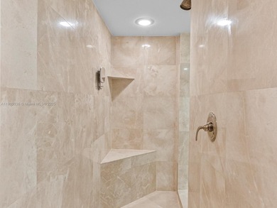 Commanding the skyline of Aventura, this Peninsula II penthouse