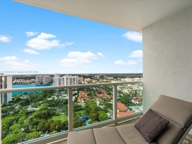 Commanding the skyline of Aventura, this Peninsula II penthouse