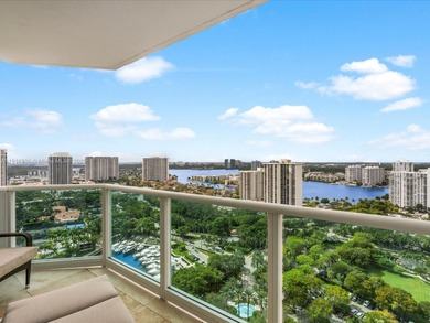 Commanding the skyline of Aventura, this Peninsula II penthouse