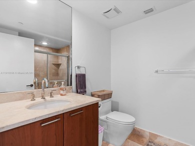 Commanding the skyline of Aventura, this Peninsula II penthouse