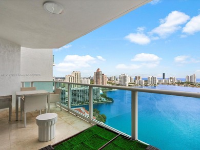 Commanding the skyline of Aventura, this Peninsula II penthouse