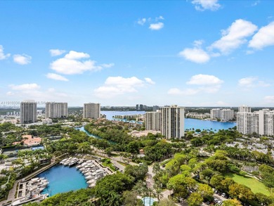 Commanding the skyline of Aventura, this Peninsula II penthouse