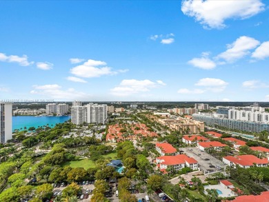 Commanding the skyline of Aventura, this Peninsula II penthouse