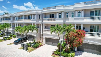 Newly priced! This gorgeous three level townhome located in an