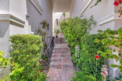 Newly priced! This gorgeous three level townhome located in an