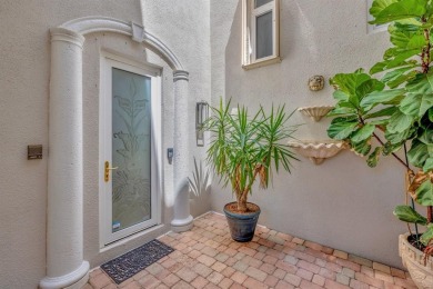 Newly priced! This gorgeous three level townhome located in an